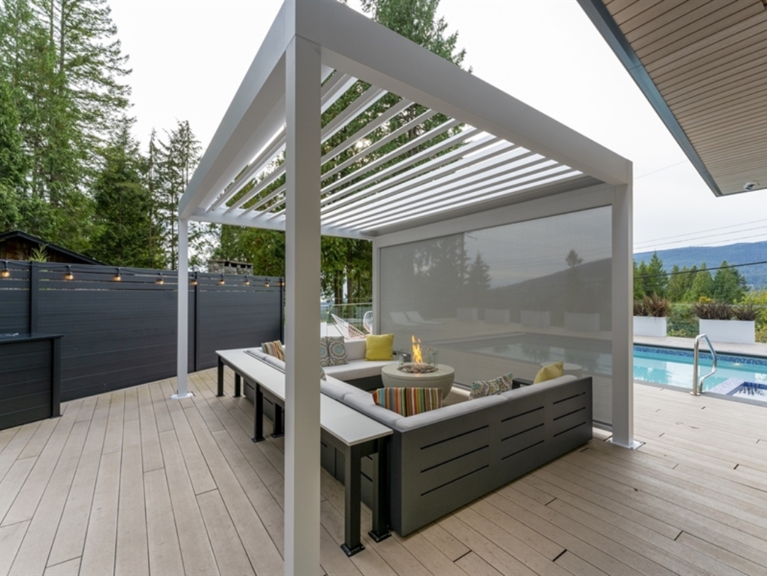 white louvred pergola with louvres open 